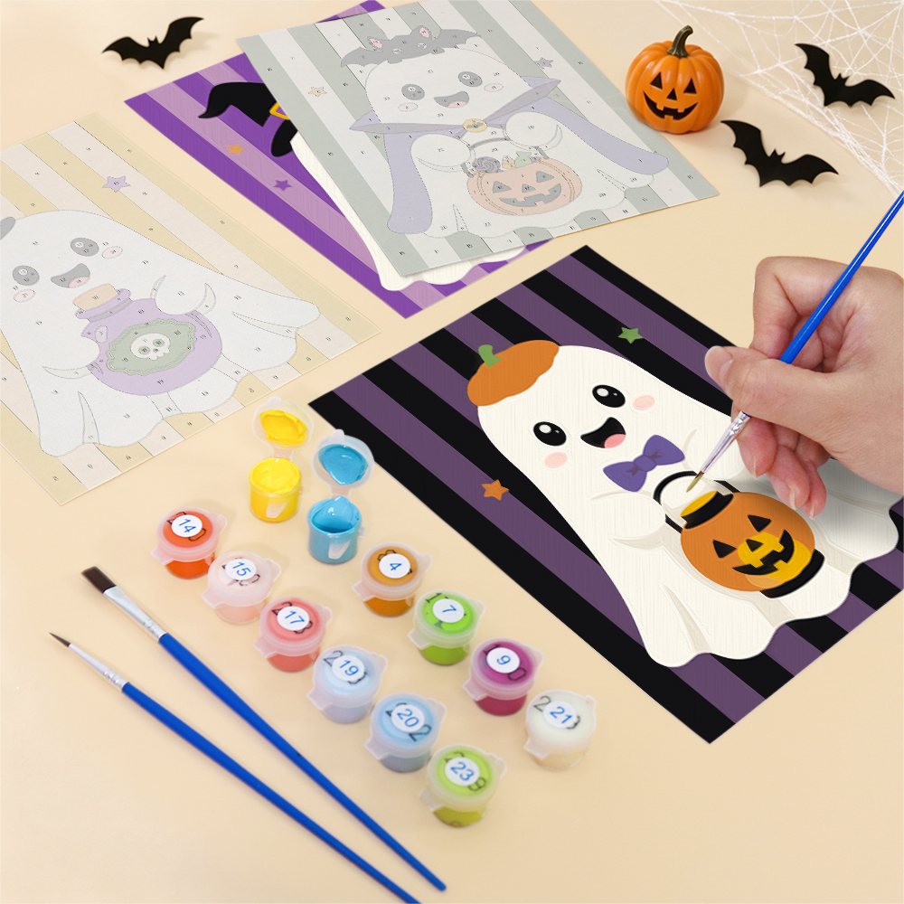 Filling in a Striped Ghosties mini canvas with numbered acrylic paints and a fine brush