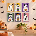 Striped Ghosties mini paintings displayed as a gallery wall in a sunny kitchen