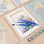 Numbered paint pots and brushes on a pre-stretched Style Critters mini canvas