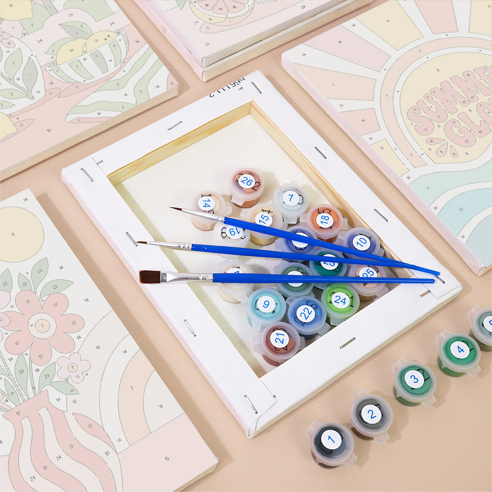 Numbered paint pots and brushes on a pre-stretched Summer Glow mini canvas