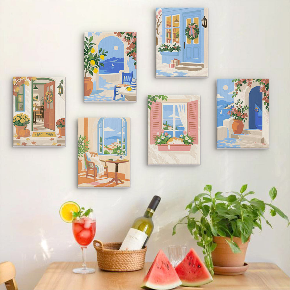 Six finished Sunny Doorways mini paintings hung on a wall above a table