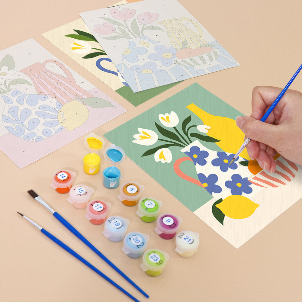 Filling in a Sunny Kitchen Table mini canvas with numbered acrylic paints and a fine brush