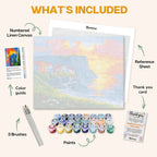 What's included in the Sunset Over the Coastal Cliffs paint by numbers kit: numbered linen canvas, reference sheet, color guide, 24 acrylic paints, 3 brushes and thank you card