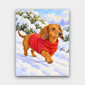 Sweater Weather Stroll paint by numbers kit of a dachshund in a red knitted sweater trotting along a snowy path