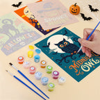 Filling in a Sweet Frights mini canvas with numbered acrylic paints and a fine brush