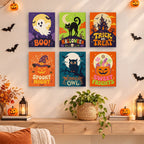 Sweet Frights mini paintings displayed as a gallery wall in a sunny kitchen