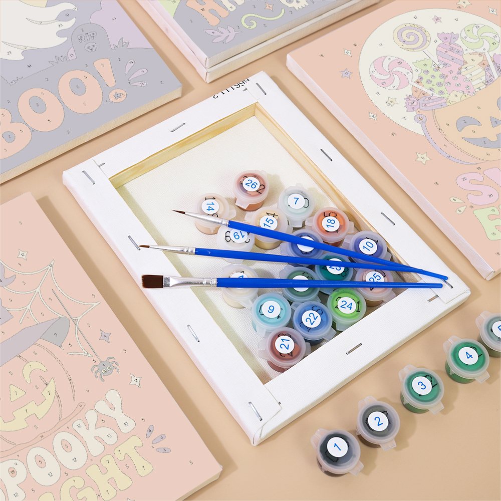 Numbered paint pots and brushes on a pre-stretched Sweet Frights mini canvas
