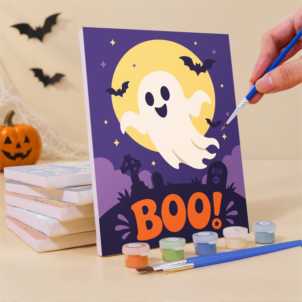 Painting a Sweet Frights mini canvas propped up beside numbered acrylic paints