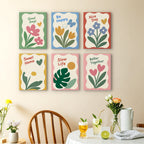 Sweet Sayings mini paintings displayed as a gallery wall in a sunny kitchen