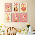 Sweet Shop mini paintings displayed as a gallery wall in a sunny kitchen