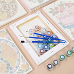 Numbered paint pots and brushes on a pre-stretched Tablecloth Treats mini canvas
