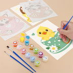 Filling in a Teacup Critters mini canvas with numbered acrylic paints and a fine brush