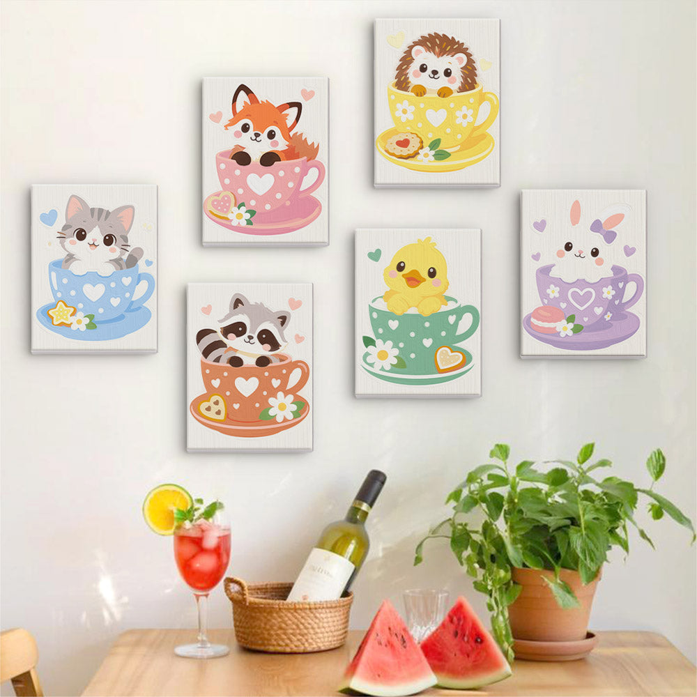 Six finished Teacup Critters mini paintings hung on a wall above a table
