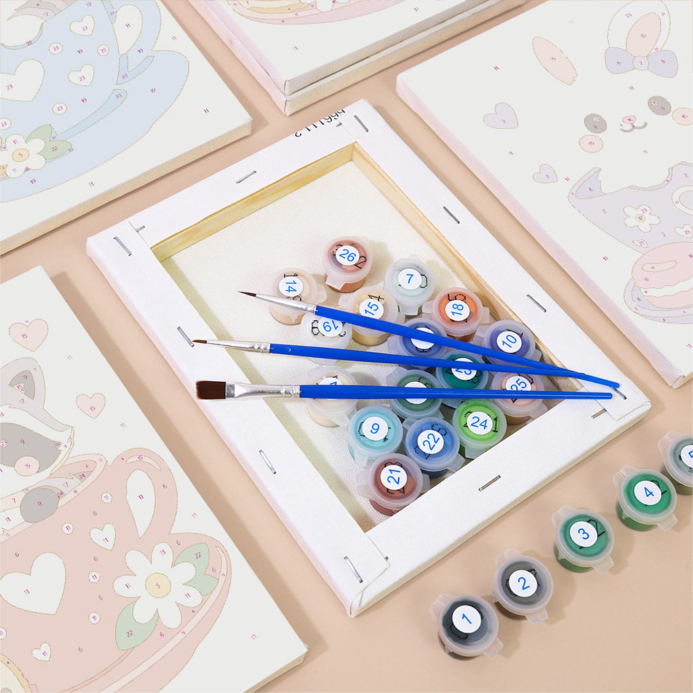 Numbered paint pots and brushes on a pre-stretched Teacup Critters mini canvas