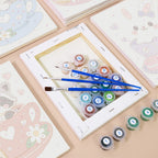 Numbered paint pots and brushes on a pre-stretched Teacup Critters mini canvas