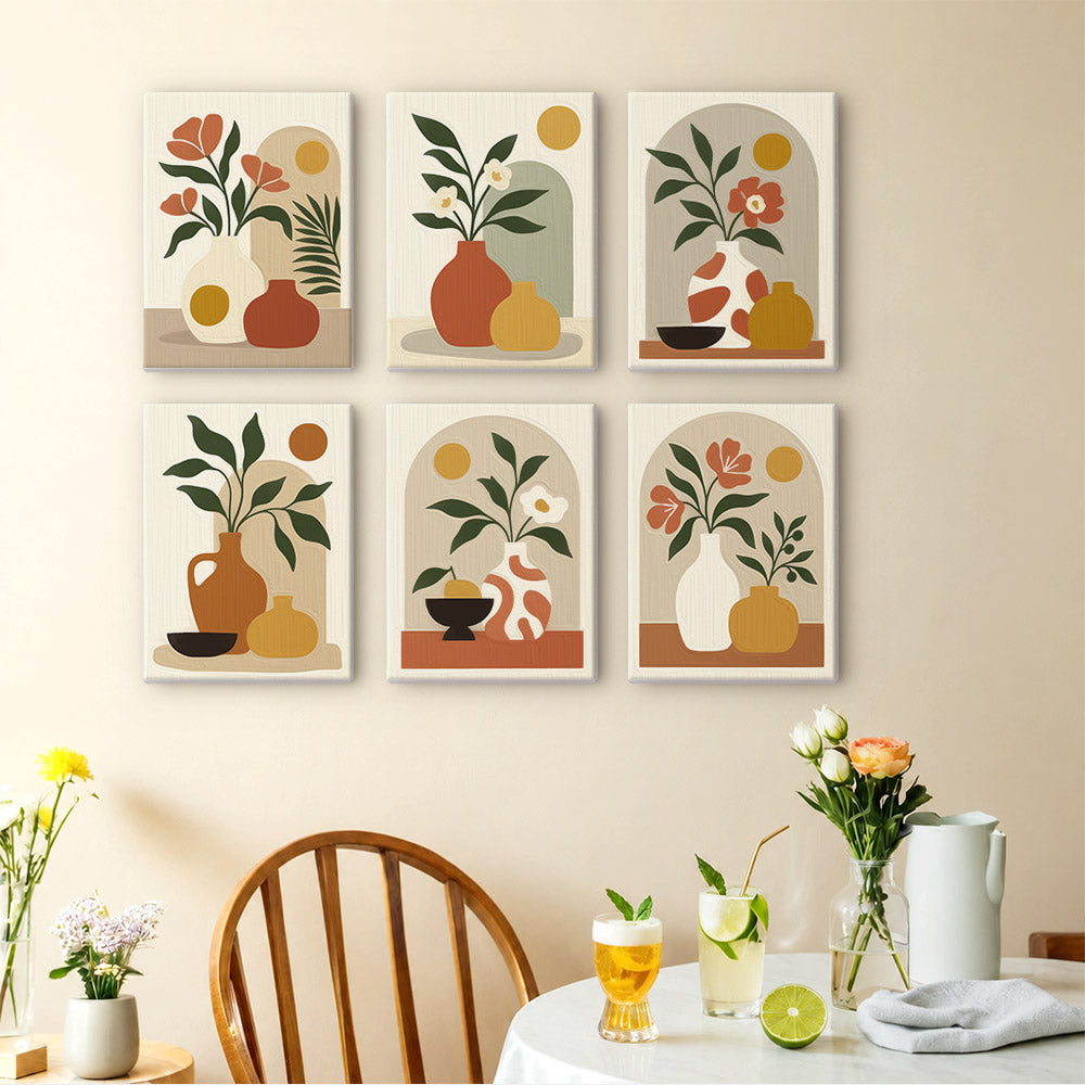 Terracotta Arches mini paintings displayed as a gallery wall in a sunny kitchen