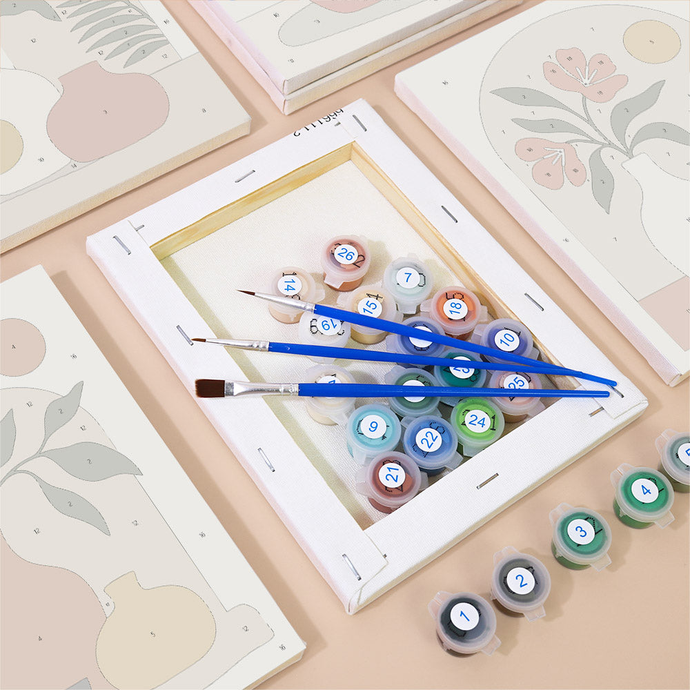 Numbered paint pots and brushes on a pre-stretched Terracotta Arches mini canvas
