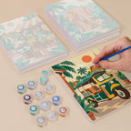 Painting one of the Thailand Escape designs next to a stack of mini canvases