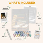 What's included in The Forgotten Pages paint by numbers kit: numbered linen canvas, reference sheet, color guide, 24 acrylic paints, 3 brushes and thank you card
