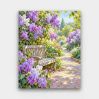 The Lilac Bench paint by numbers kit of a garden path lined with blooming lilacs and an old wooden bench in dappled light