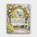 The Rose Arch Bench paint by numbers kit of a white garden bench beneath an arch of pink and cream climbing roses