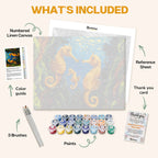 What's included in The Seahorse Family paint by numbers kit: numbered linen canvas, reference sheet, color guide, 24 acrylic paints, 3 brushes and thank you card