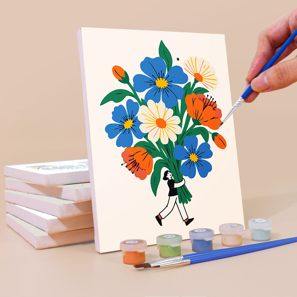 Painting a Tiny Gardeners mini canvas propped up beside numbered acrylic paints