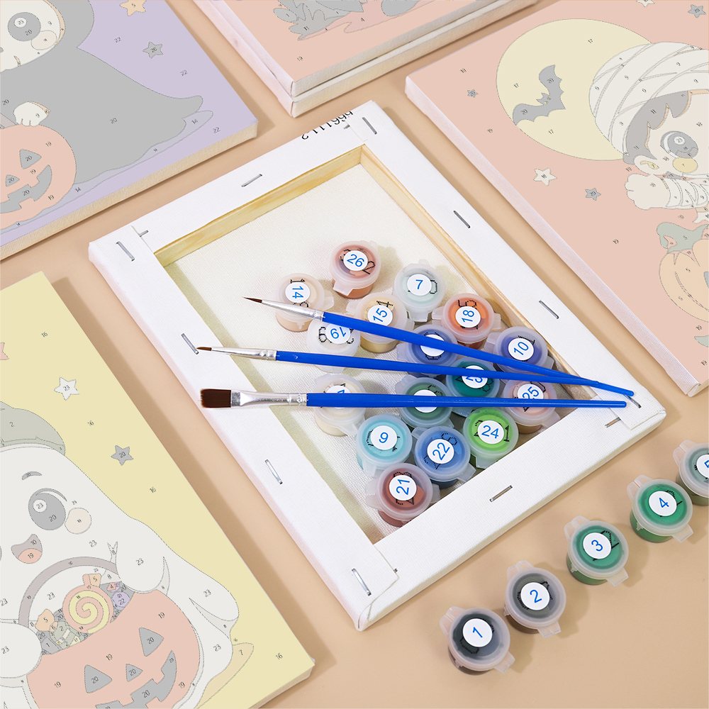 Numbered paint pots and brushes on a pre-stretched Tiny Trick-or-Treaters mini canvas