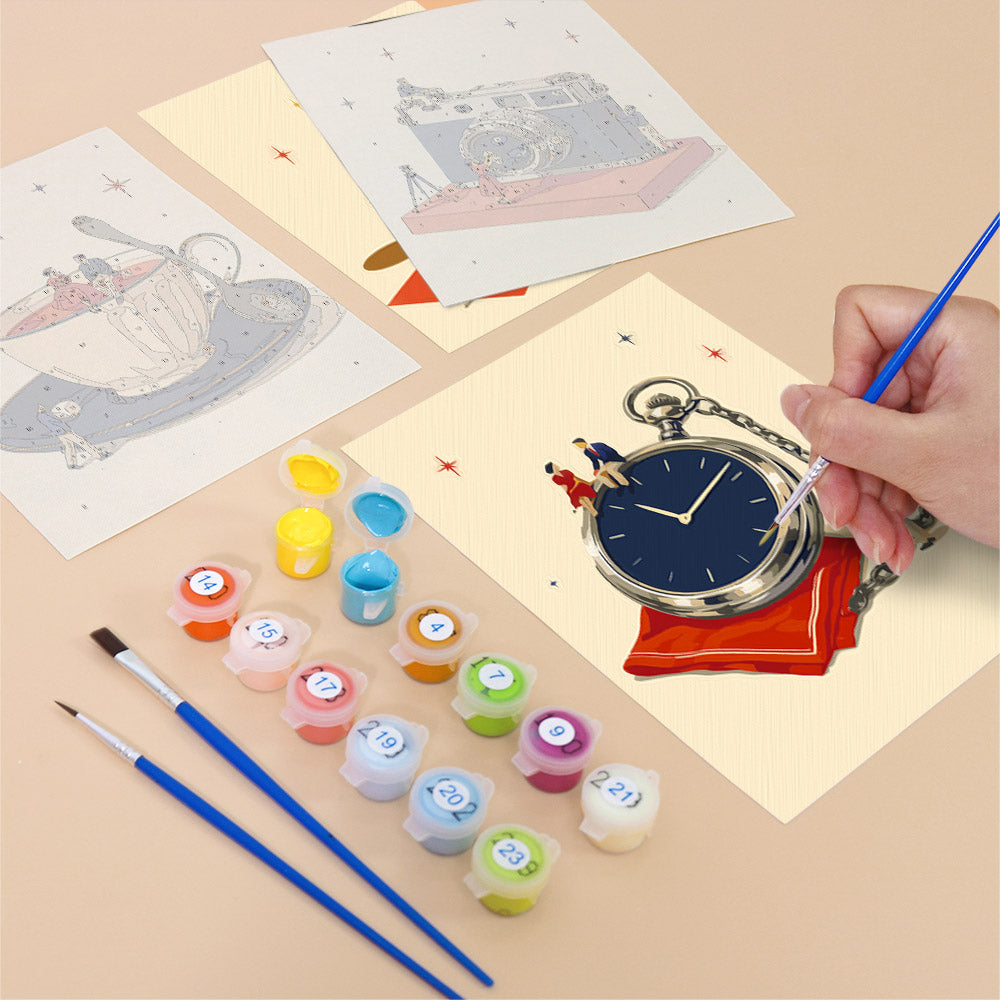 Filling in a Tiny Worlds mini canvas with numbered acrylic paints and a fine brush