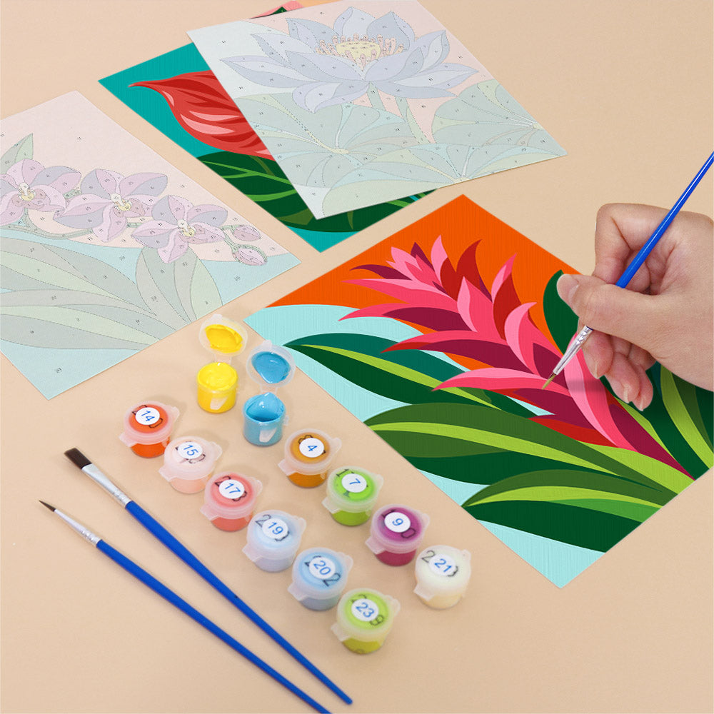 Filling in a Tropical Blooms mini canvas with numbered acrylic paints and a fine brush