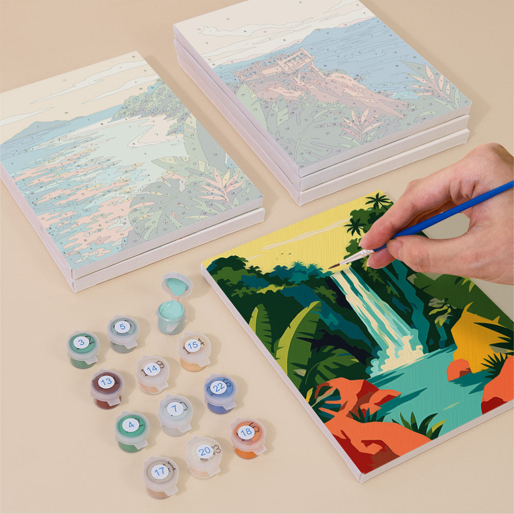 Painting one of the Tropical Coastlines designs next to a stack of mini canvases