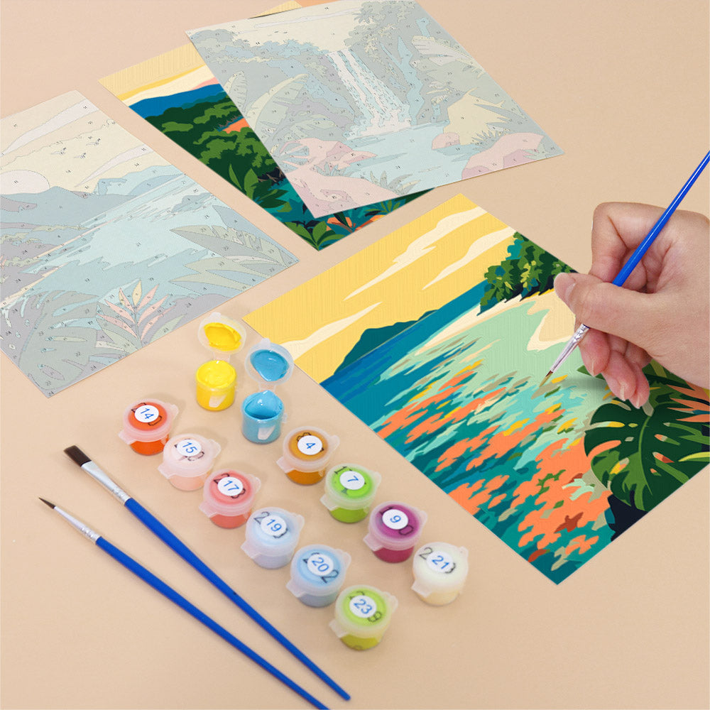 Filling in a Tropical Coastlines mini canvas with numbered acrylic paints and a fine brush