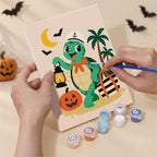 Numbered paint pots and brushes on a pre-stretched Tropical Critter Halloween mini canvas