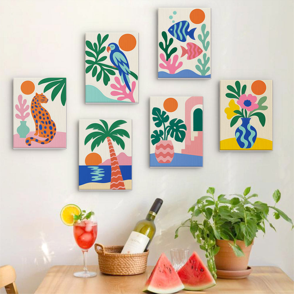 Six finished Tropical Cutouts mini paintings hung on a wall above a table