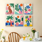Tropical Cutouts mini paintings displayed as a gallery wall in a sunny kitchen