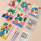 Tropical Cutouts mini paint by numbers kit with six numbered canvases, acrylic paints, brushes and layout