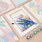 Numbered paint pots and brushes on a pre-stretched Tropical Cutouts mini canvas