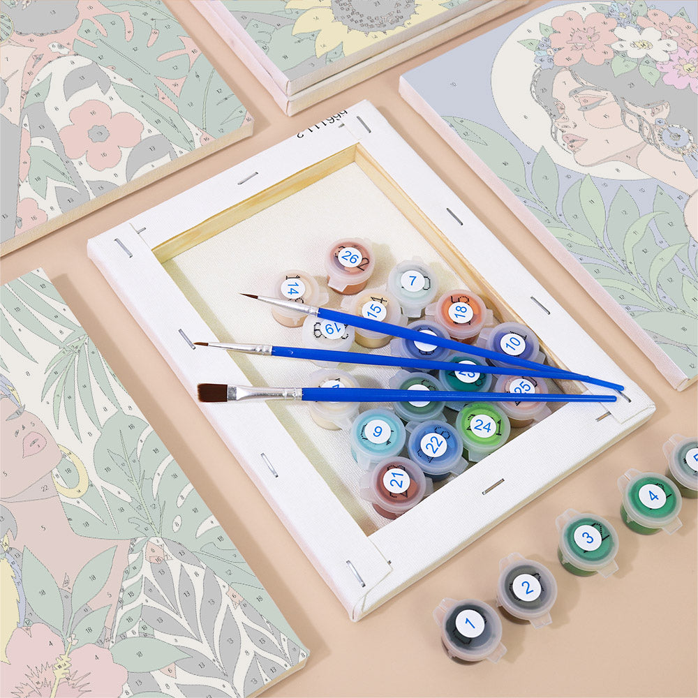 Numbered paint pots and brushes on a pre-stretched Tropical Muses mini canvas