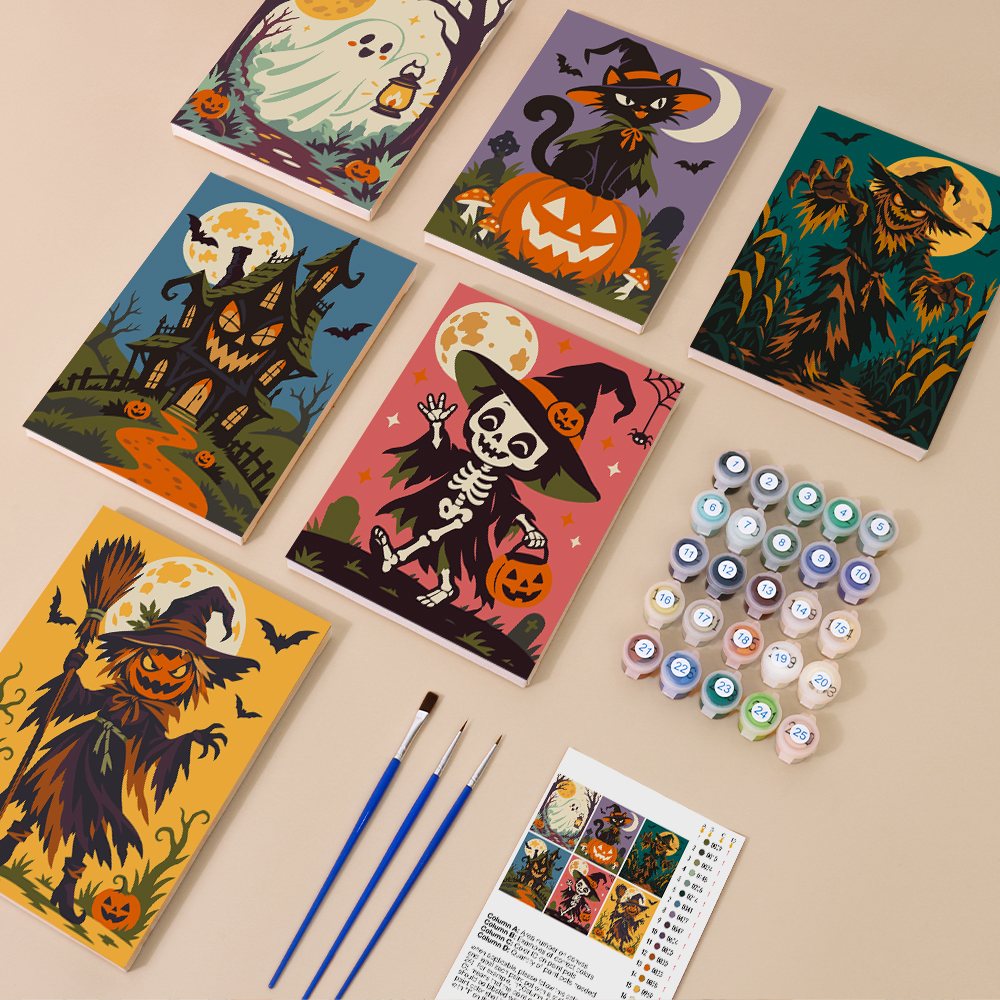 Painting one of the Twilight Harvest Frights designs next to a stack of mini canvases