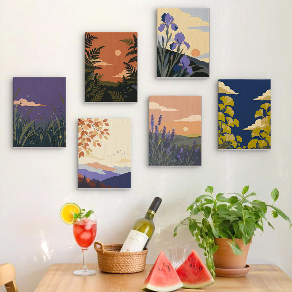 Six finished Twilight Meadows mini paintings hung on a wall above a table