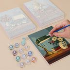 Painting one of the Vintage Keepsakes designs next to a stack of mini canvases