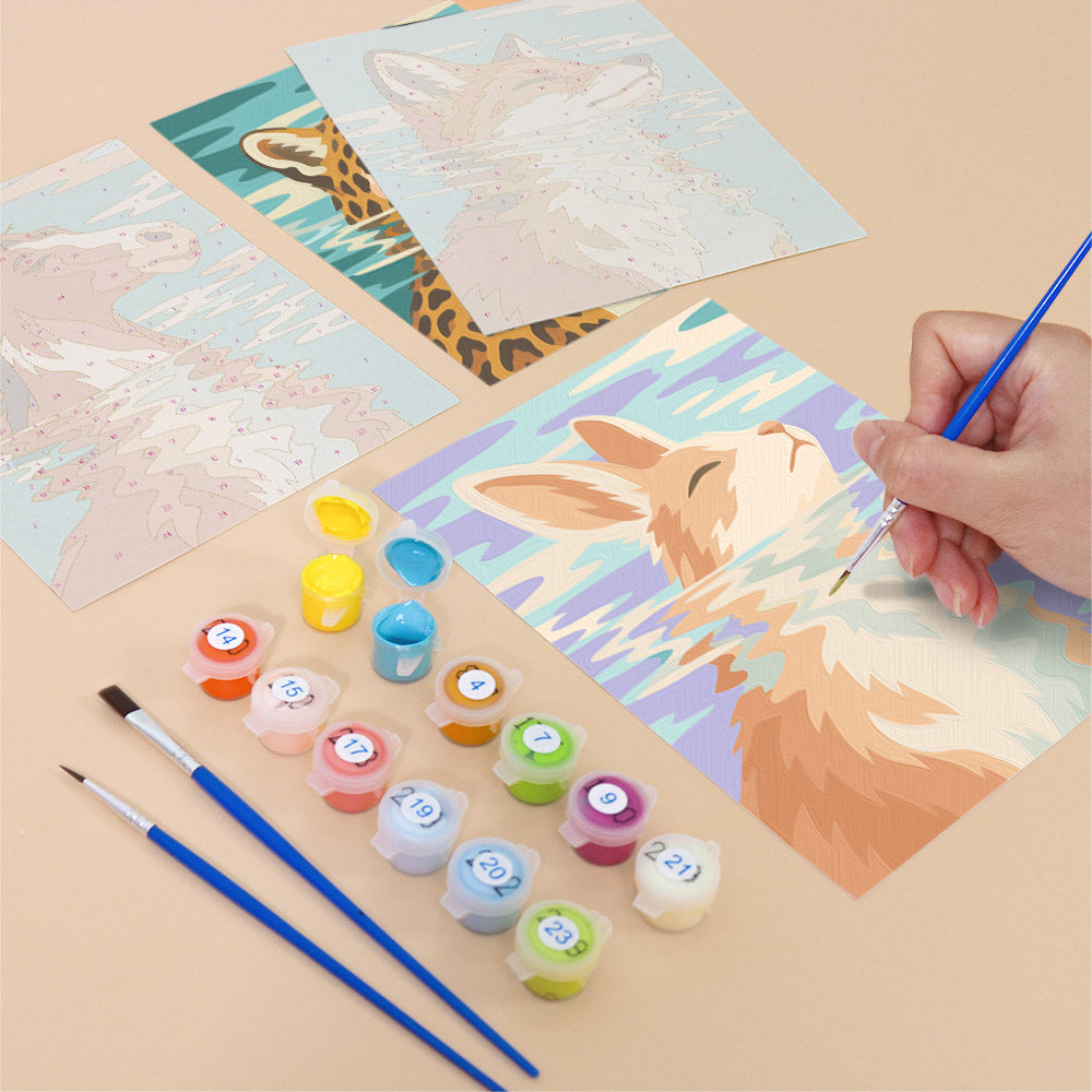 Filling in a Water Reflections mini canvas with numbered acrylic paints and a fine brush
