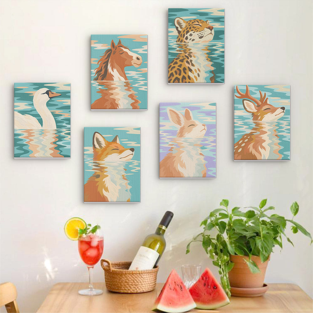 Six finished Water Reflections mini paintings hung on a wall above a table
