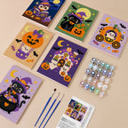 Painting one of the Whimsical Witchy Wonders designs next to a stack of mini canvases