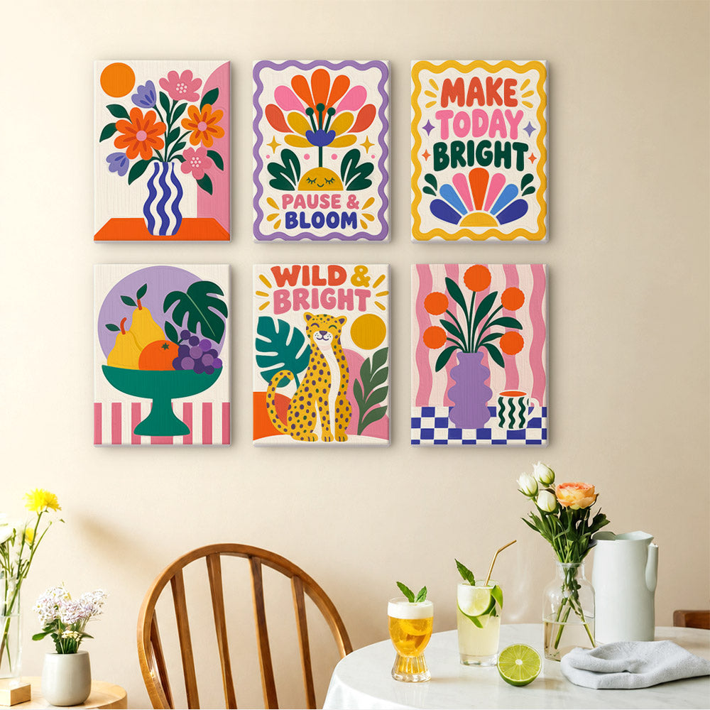 Wild & Bright mini paintings displayed as a gallery wall in a sunny kitchen