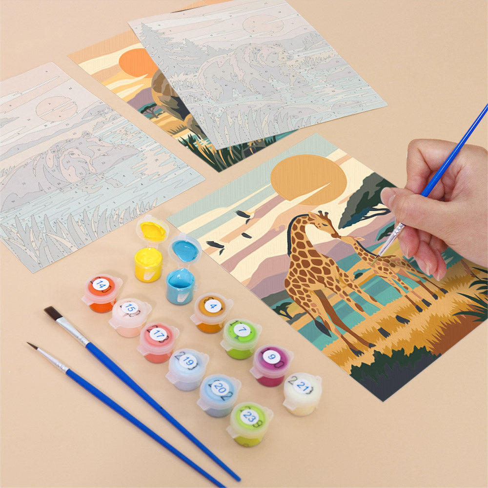 Filling in a Wild Waterholes mini canvas with numbered acrylic paints and a fine brush