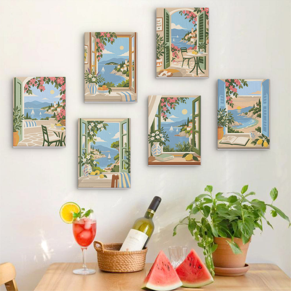 Six finished Windows to the Sea mini paintings hung on a wall above a table