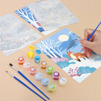 Filling in a Winter Wonderland mini canvas with numbered acrylic paints and a fine brush