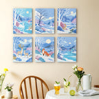 Winter Wonderland mini paintings displayed as a gallery wall in a sunny kitchen