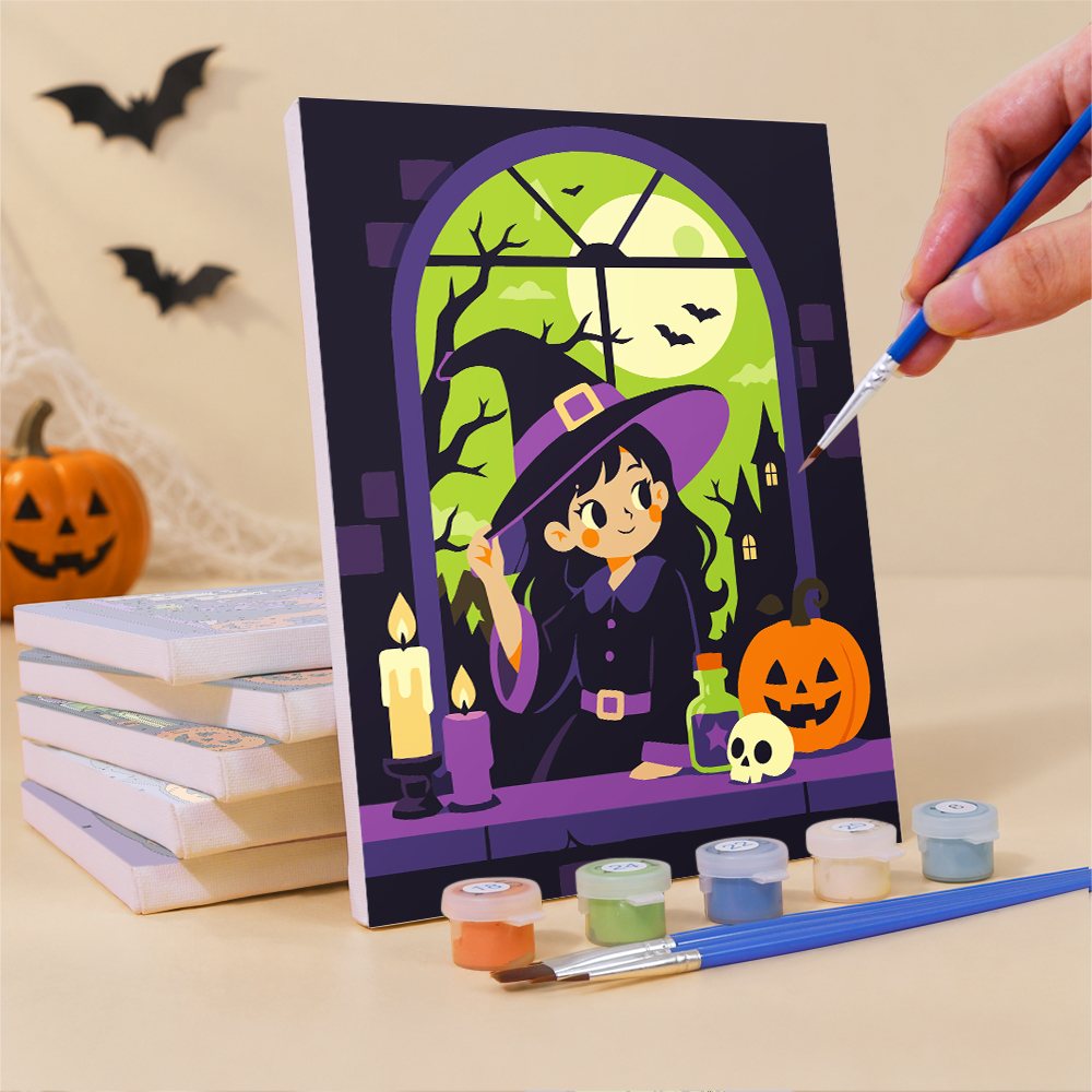Painting a Witching Windows mini canvas propped up beside numbered acrylic paints